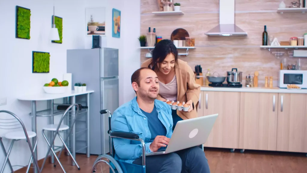 wheelchair guy using laptop